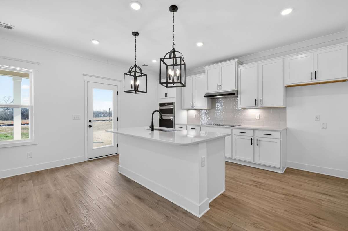 **Photos are of a model home and will not match all selections in subject property**
