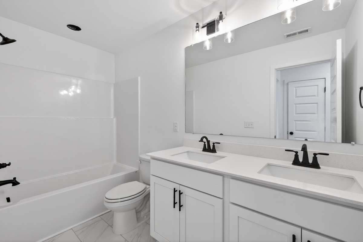 **Photos are of a model home and will not match all selections in subject property**