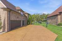 The 3-car attached garage allows plenty of room for your cars and toys, and the driveway is level & wide for company.