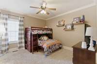 Bedroom 3 is on the main level & connects to a full bath shared with bedroom 2.