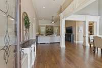 The large foyer area opens to the dining and great room.