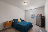 Secondary Bedroom with Furniture. Easily accommodates a Queen size bed!