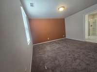 Primary Bedroom with an En-suite Bathroom