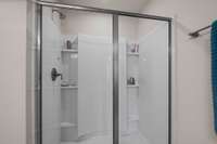 Primary Bathroom with a Spacious walk-in shower