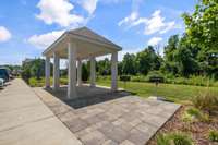 Covered Pavilion and Grills across the parking lot from home