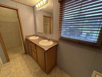 No waiting on the sink here! Double vanities provide space for two.