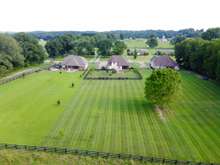 Aerial View of Home (middle). Expansive 1.02 Acre Lot.