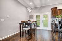 Kitchen has eat-in dining nook with access to covered patio!