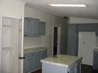 kitchen from dining room showing island and pantry