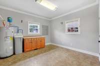 Utility Room with extra cabinets and closet 