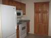 Kitchen with newer refrigerator & microwave * Wonderful pantry & lots of cabinets * Tile flooring *