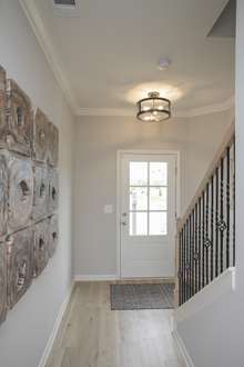 (Photos of Model Home)Wide extended foyer off entrance!