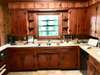 Large vintage knotty pine kitchen. A terrific space for those who like to cook & entertain. 