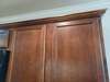 Maple cabinets measure 30", and have detailed trim at the top, room to place your pretties!