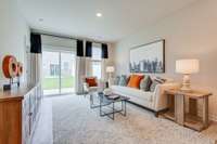 Living room with great natural light  *Photo of decorated model home