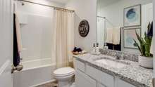 Second Full Bath with GRANITE.  Picture of model home.