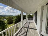 View from the other side of the balcony - relax & enjoy the breathtaking sunsets. Low maintenance slate flooring on the balcony.