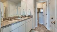 Walk into this owner suite with a private water closet, and large shower!
