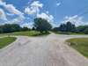 Head straight up the driveway to this beautiful 10 Acre peaceful setting!