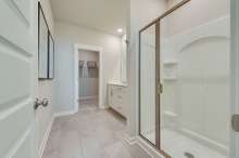 Primary bath with oversized shower  *Photo of decorated model home