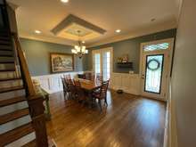 Large Dining Room with French Doors and Front Entry of the Home. 