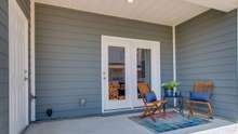 Large Covered Patio with Storage.  Picture of model home.