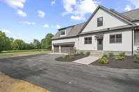 Paved drive and top landscaping. 