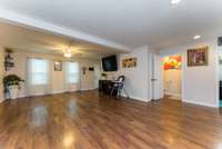 This spacious Great Room has laminate flooring and is a great space!