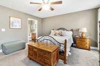 View of primary bedroom into the primary bath.