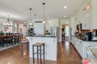 Granite Countertops - Hardwood Floors - SS Appliances 