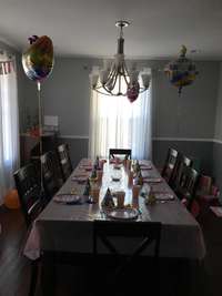 Get the party started in this beautiful dining room with french doors, recessed lighting, and hardwoods!