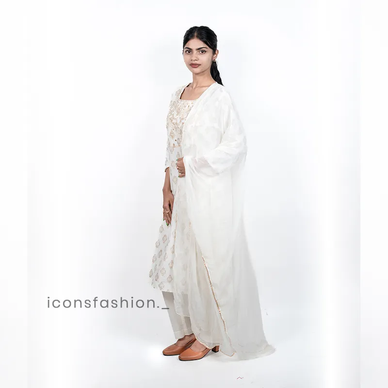Women-white-printed-kurta-set-with-golden-ethnic-motifs-three-quarter-sleeves-matching-pants-and-a-sheer-dupatta
