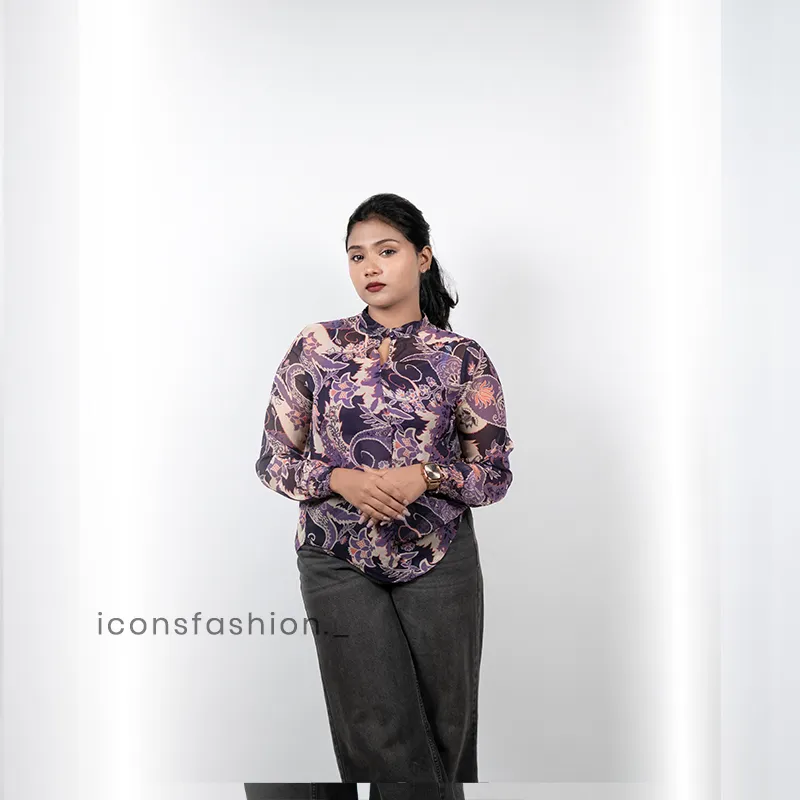 Women-wearing-a-purple-floral-print-high-neck-top-with-full-sleeves-mock-detailing-and-a-relaxed-fit-design