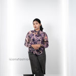 Women-wearing-a-purple-floral-print-high-neck-top-with-full-sleeves-mock-detailing-and-a-relaxed-fit-design