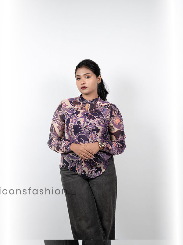 Women-wearing-a-purple-floral-print-high-neck-top-with-full-sleeves-mock-detailing-and-a-relaxed-fit-design