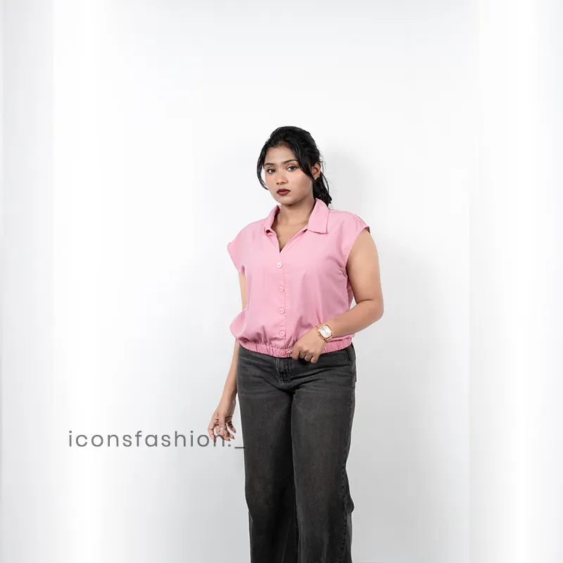 Woman-pink-sleeveless-collared-button-down-casual-top