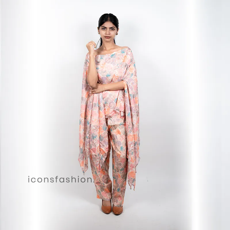Woman-pastel-peach-pink-floral-printed-kaftan-co-ord-set-with-draped-sleeves-and-relaxed-fit-pants