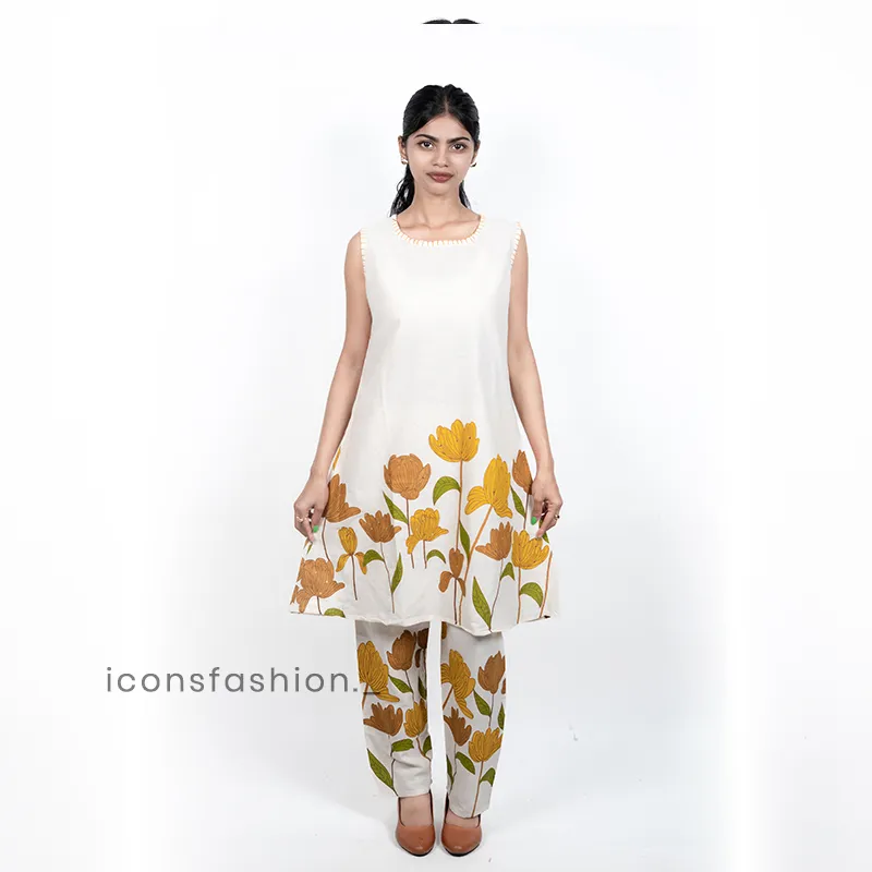 Women-an-yellow-sleeveless-floral-printed-A-line-kurta-set-with-matching-printed-pants-and-a-round-neckline