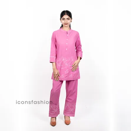 Women-pink-floral-embroidered-co-ord-set-with-a-mandarin-collar-three-quarter-sleeves-and-matching-straight-fit-pants