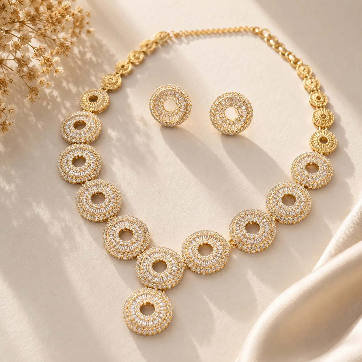 Gold-tone-crystal-studded-circular-necklace-set-with-matching-stud-earrings-for-women