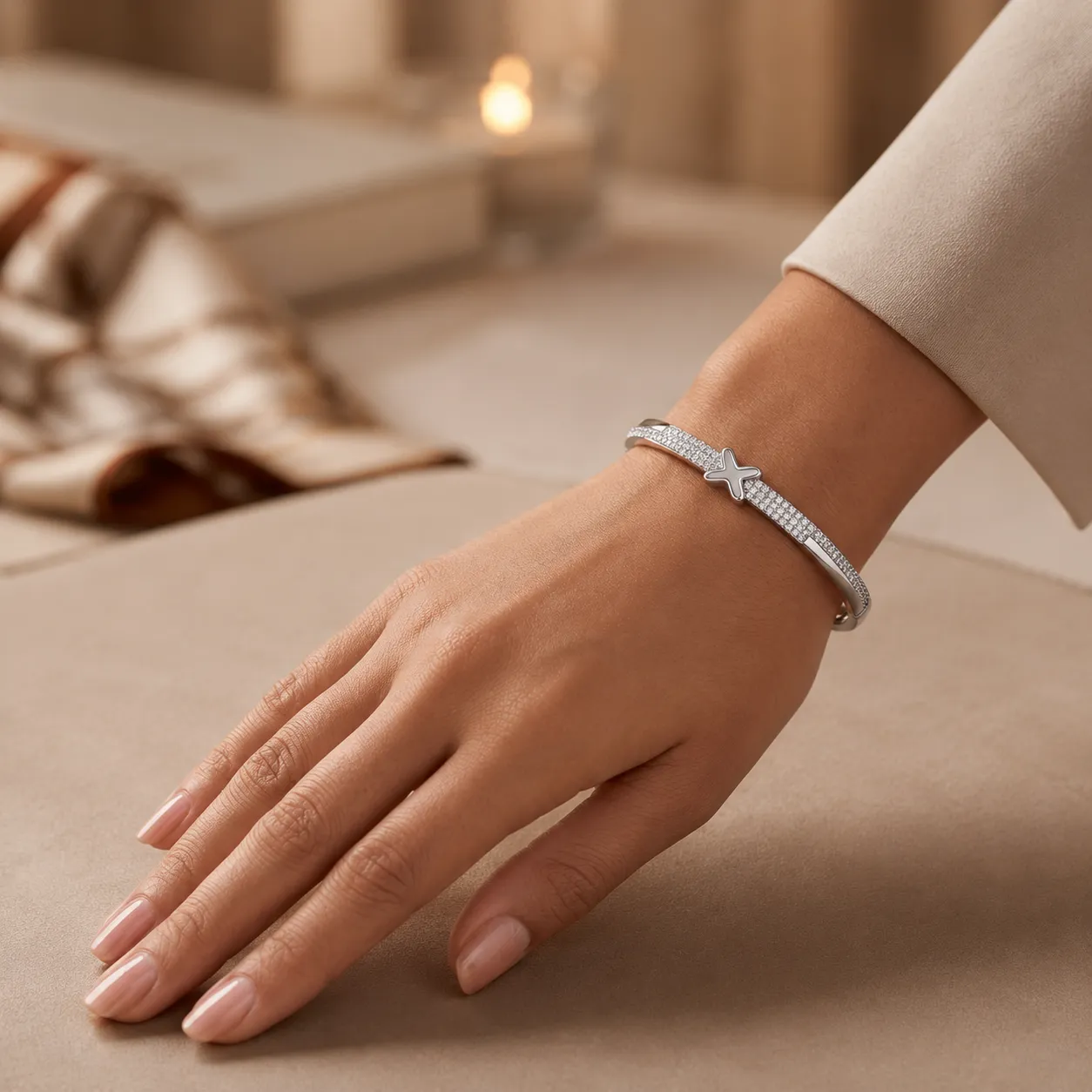 Silver-crystal-cross-bracelet-with-pave-stone-detail-and-polished-finish-for-women