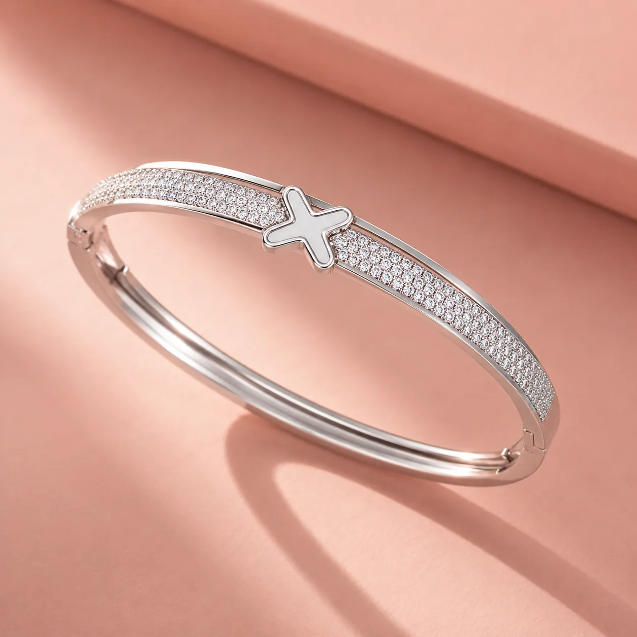 Silver-crystal-cross-bracelet-with-pave-stone-detail-and-polished-finish-for-women