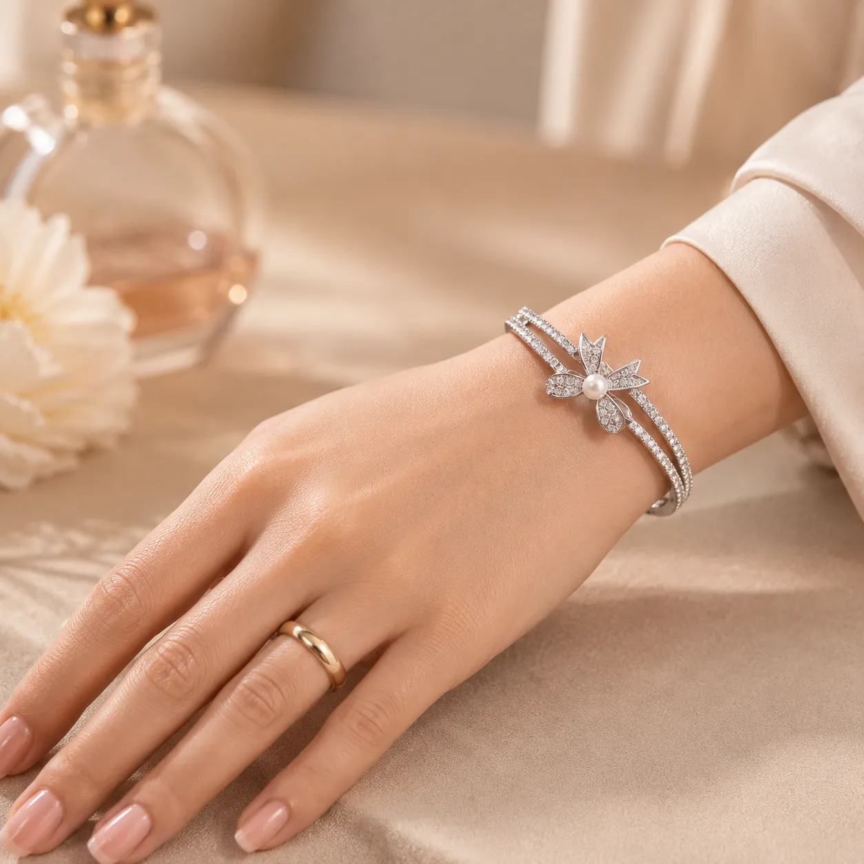 Silver-floral-pearl-bracelet-with-crystal-studded-design