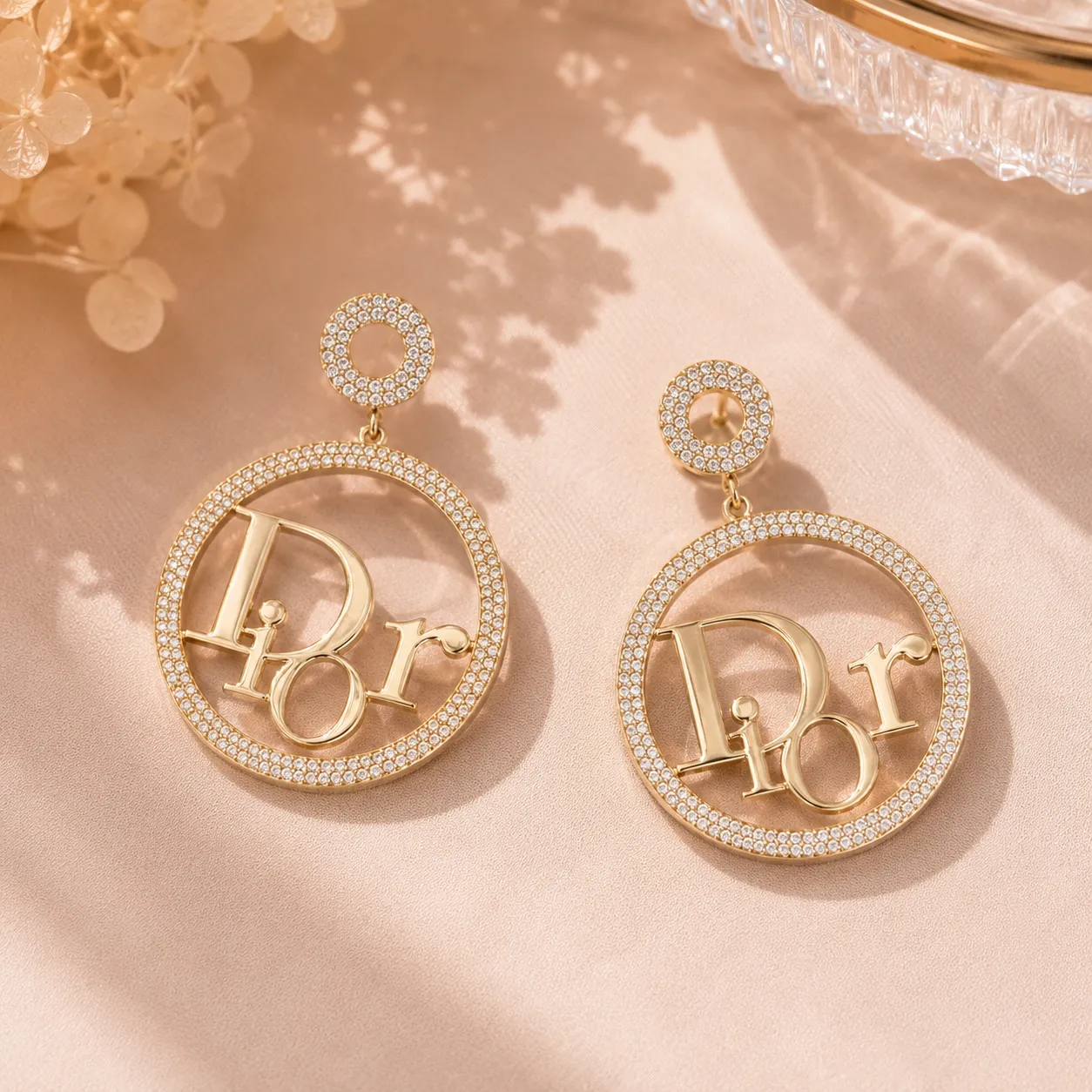Gold-crystal-studded-circular-drop-earrings-with-designer-inspired-letter-detail-for-women