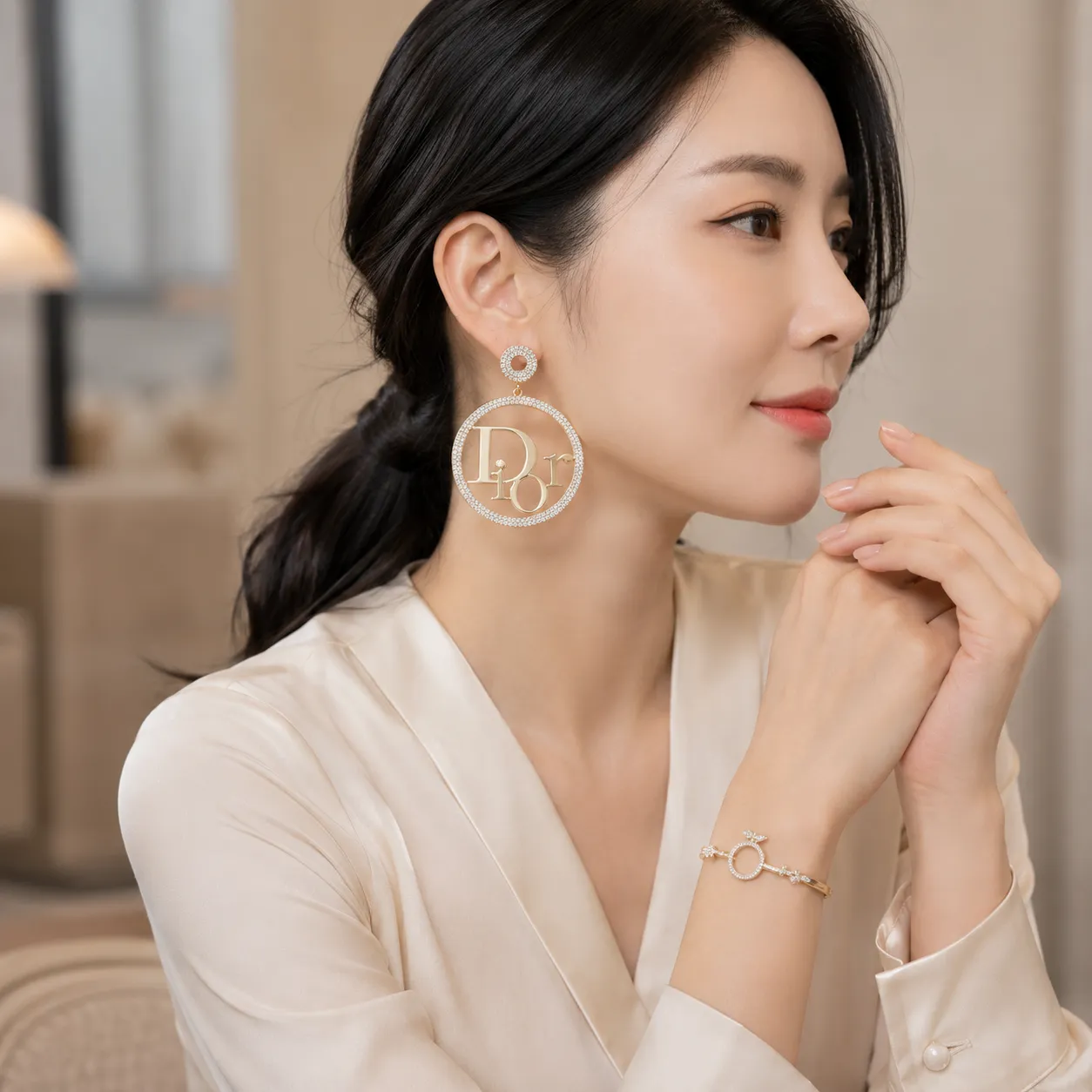 Gold-crystal-studded-circular-drop-earrings-with-designer-inspired-letter-detail-for-women