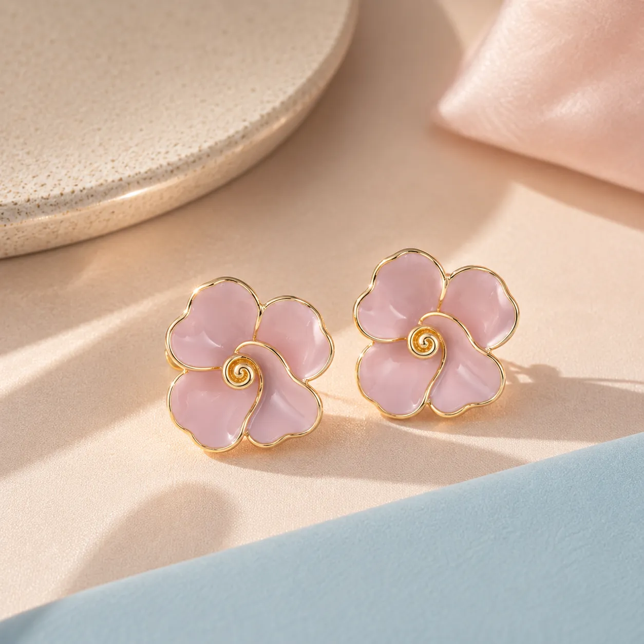Baby-pink-floral-stud-earrings-with-gold-tone-outline-and-glossy-enamel-finish-for-women