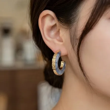 Blue-marble-enamel-mini-hoop-earrings-with-gold-tone-finish-for-women