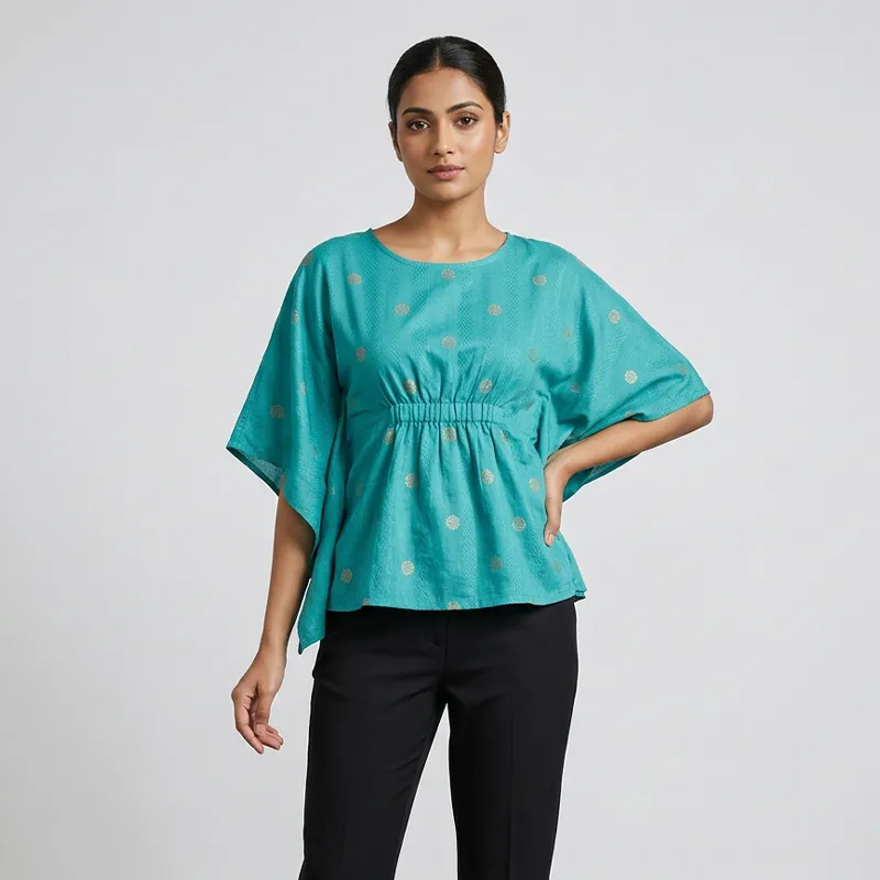 Teal-blue-metallic-foil-print-kaftan-sleeve-womens-top-with-gathered-waist-detailing-and-relaxed-fit