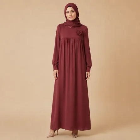 Maroon-maxi-dress-with-high-round-neckline-floral-rosette-detail-long-puff-sleeves-gathered-bodice-flowy-modest-fit