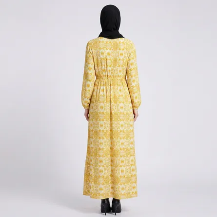 Yellow-printed-maxi-dress-with-round-neck-front-buttons-and-long-puff-sleeves